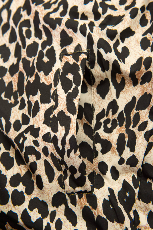 Obojstranná vesta s leopardím vzorom zelená