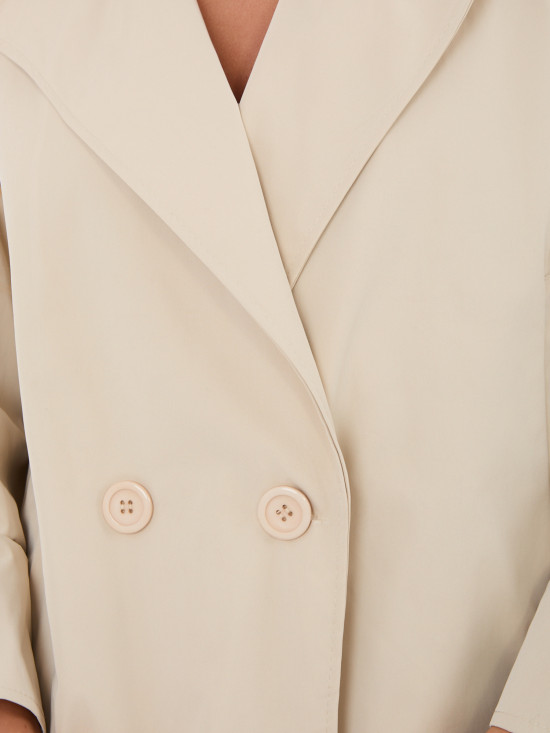 Krátky béžový prechodný kabát s podšívkou