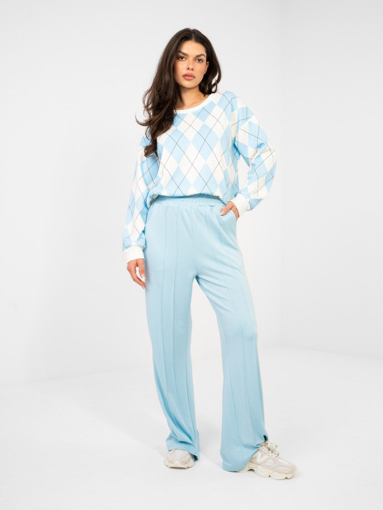 Dámske široké teplákové nohavice v svetlomodrej farbe
