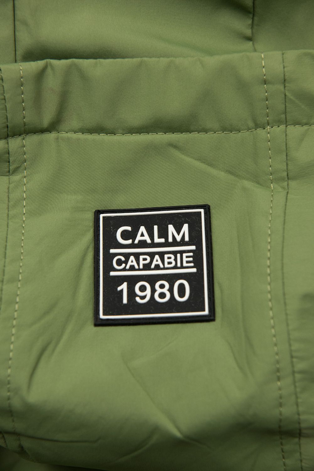 Tmavozelená prechodná parka CALM