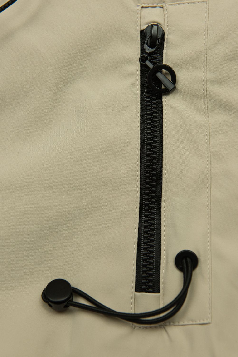 Béžová jarná parka so sťahovaním v páse