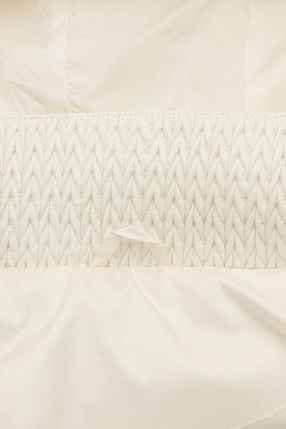 Prechodná bunda s kapucňou krémová