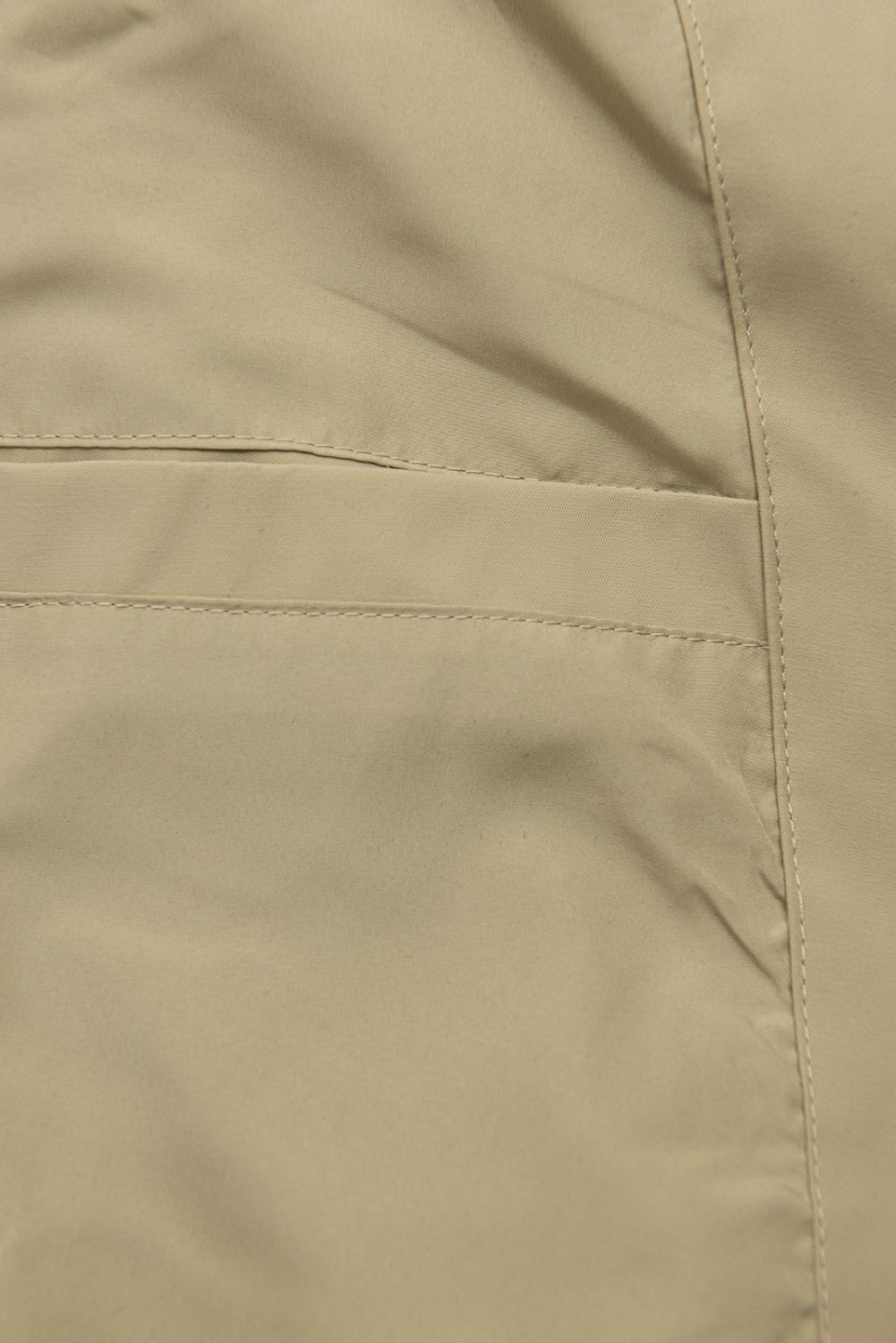 Predĺžená parka s potlačou v kapucni béžová