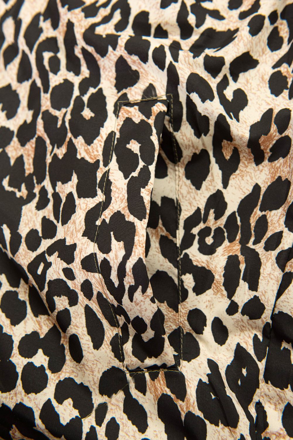 Obojstranná vesta s leopardím vzorom zelená