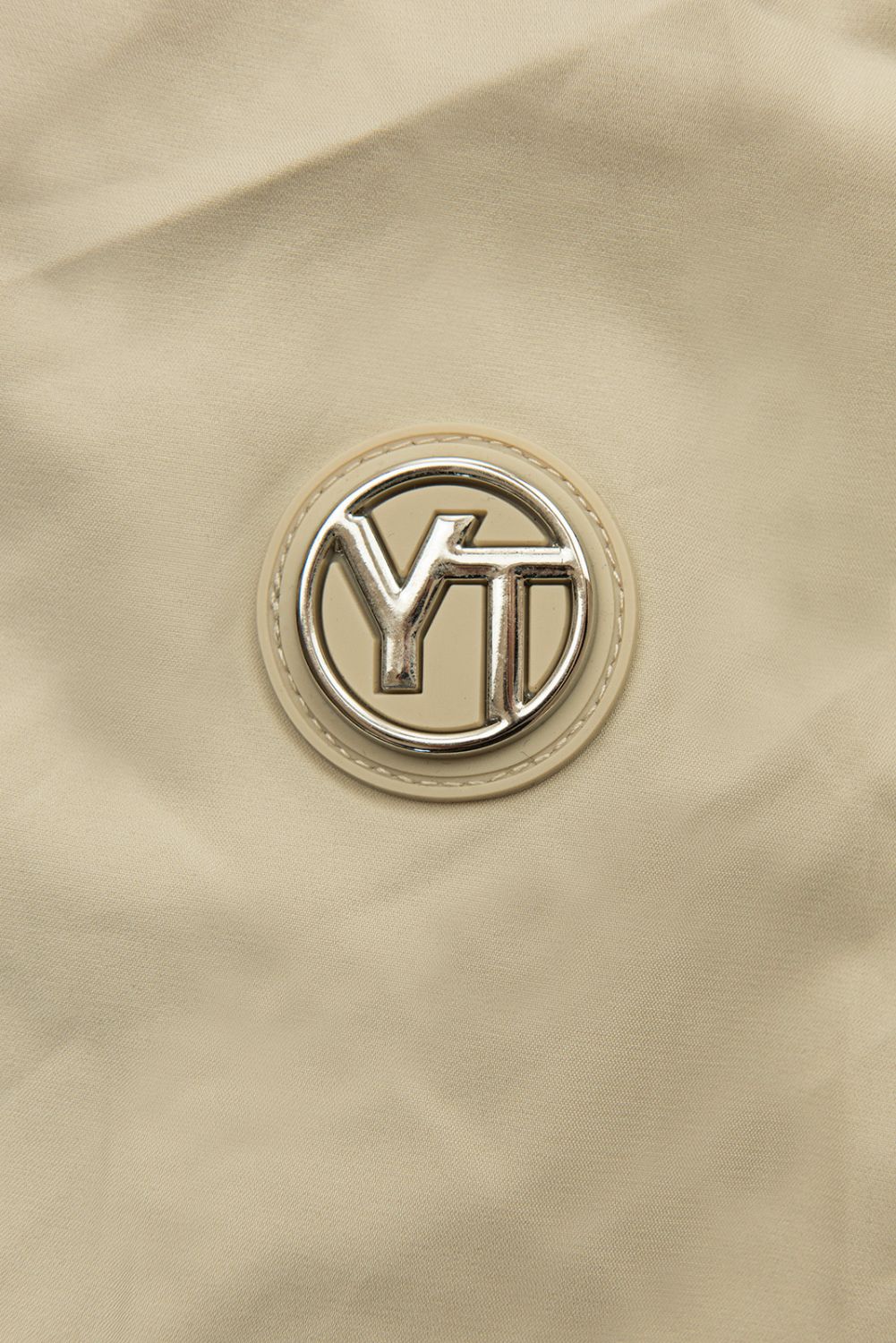 Béžová jarná parka s veľkou kapucňou