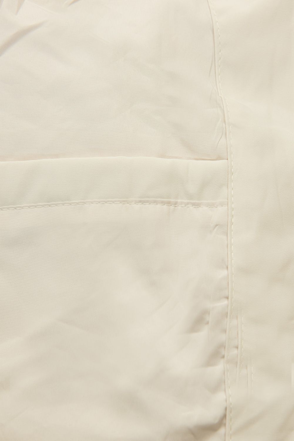 Ecru jarná parka s veľkou kapucňou