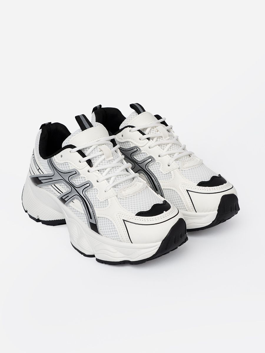 Bielo-čierne pohodlné sneakersy so sieťovinou