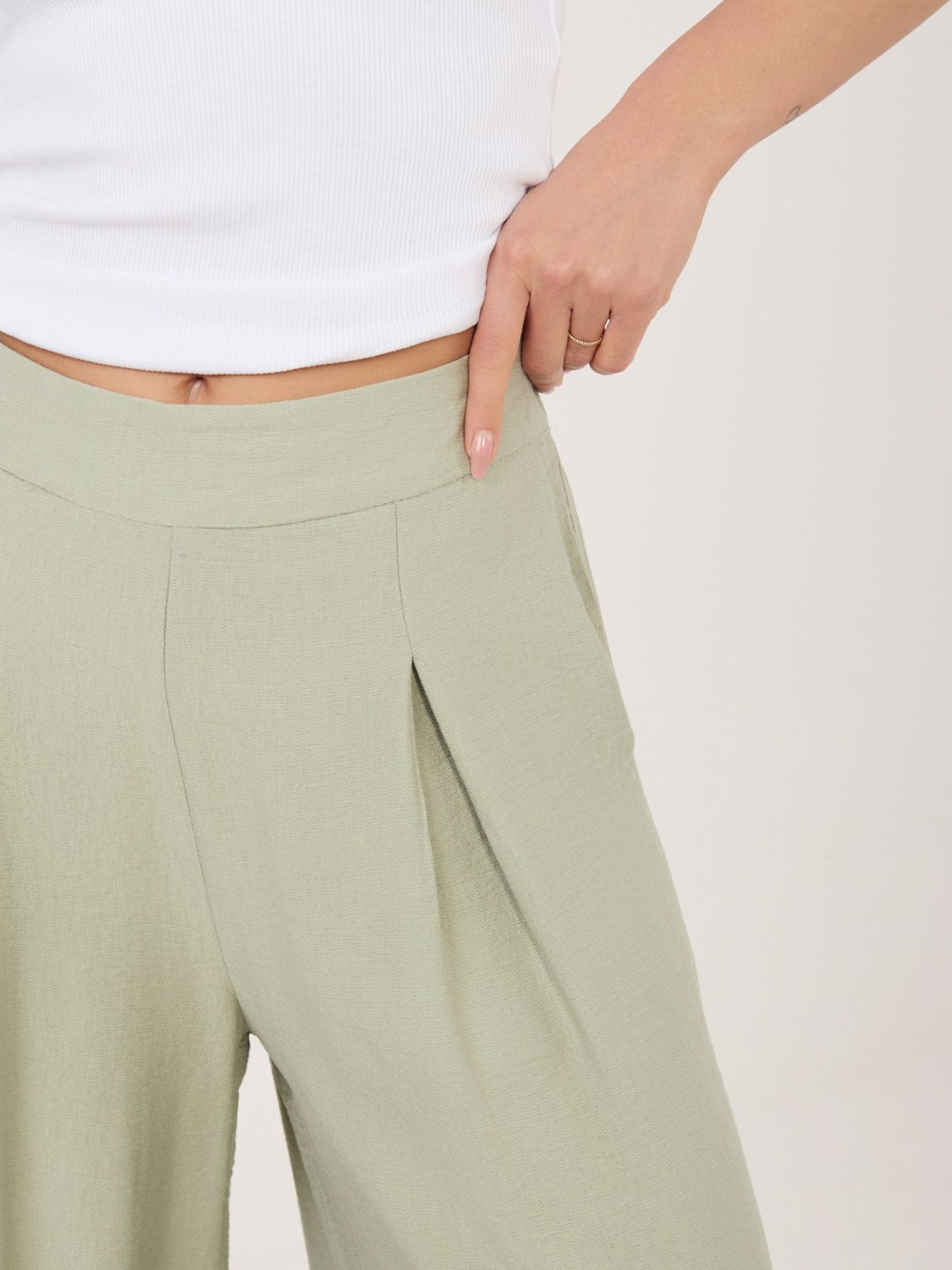 Pistáciové palazzo nohavice z viskózy