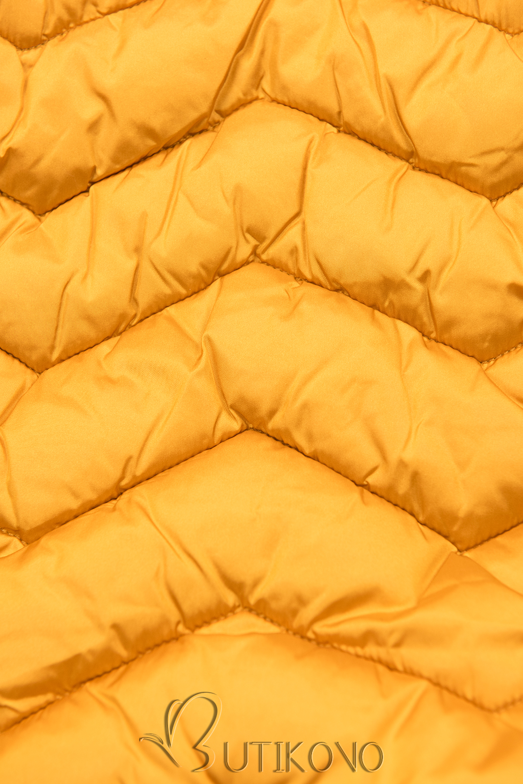 Zimná prešívaná bunda s opaskom žltá