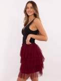 Elegantná mini sukňa s volánom v bordovej farbe