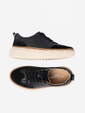 Čierne kožené sneakersy na béžovej platforme