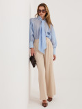 Dámska modrá košeľa s pásikmi a viazaním