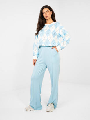 Dámske široké teplákové nohavice v svetlomodrej farbe